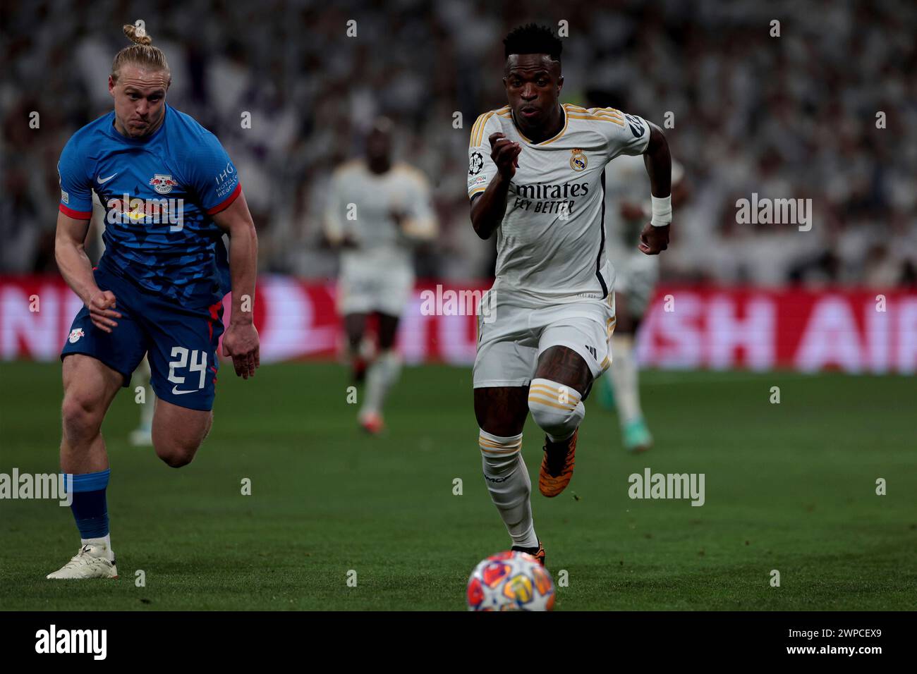 Madrid Spain; 06.03.2024.- Real Madrid player Vinicius Junior (R) and Leipzig player Xaver Schlager (L) Real Madrid draws with Leipzig but on aggregate they win 2-1 and advance to the next round of the Champion League Goal scored for Real Madrid by Vinicius Jr. 65`. Goal scored by Leipzig Willi Orban 68'. Photo: Juan Carlos Rojas Stock Photo